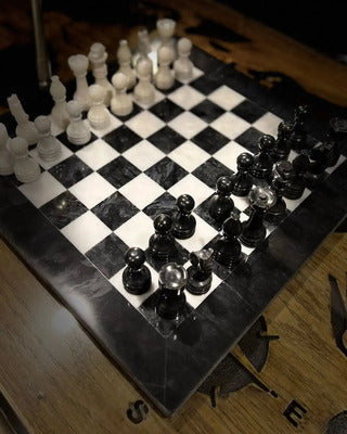 black and pink marble chess board